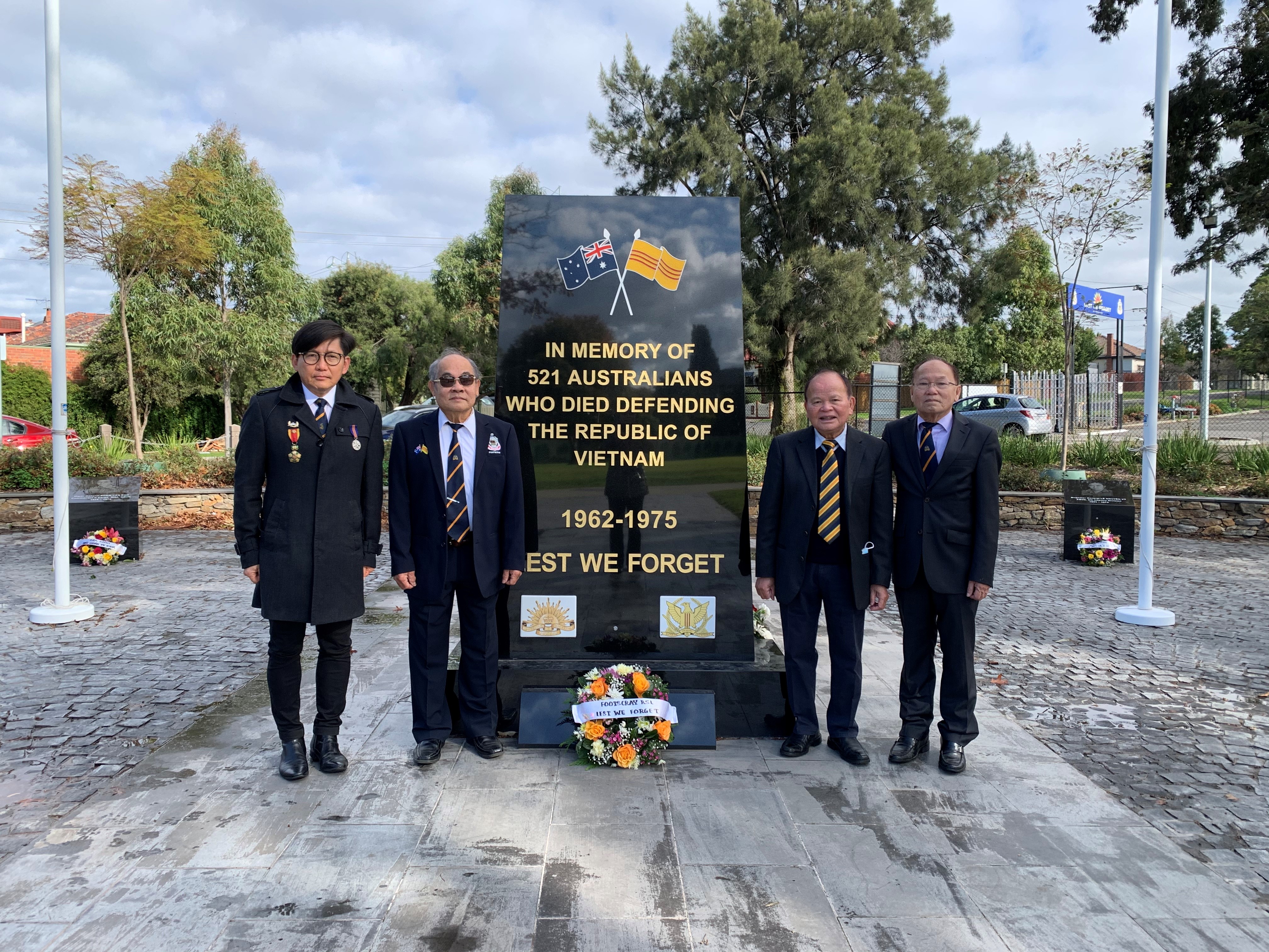 Mr Phong Nguyen OAM with colleagues at a Vietnam war memorial