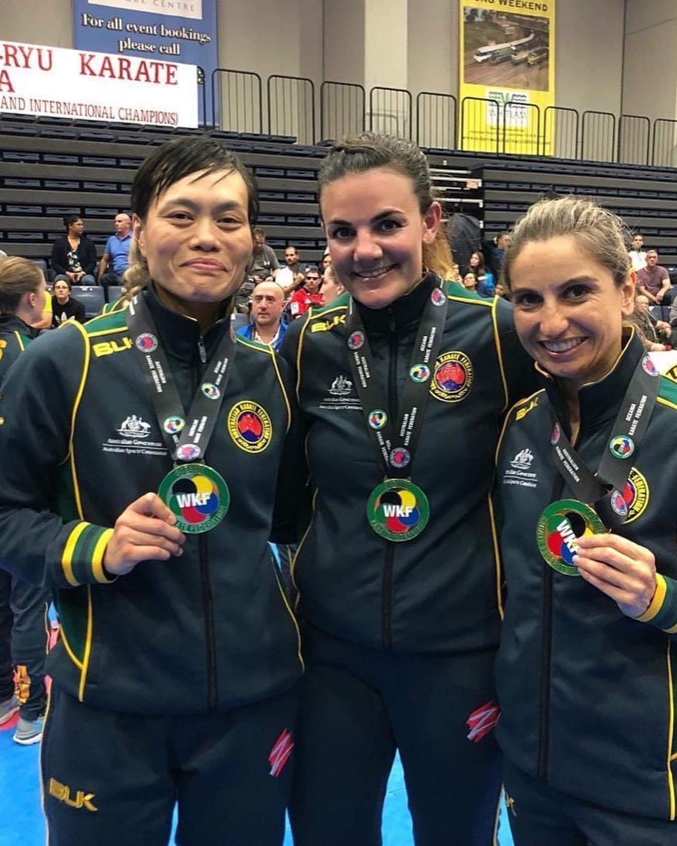 Maria Alexiadis OAM poses with colleagues