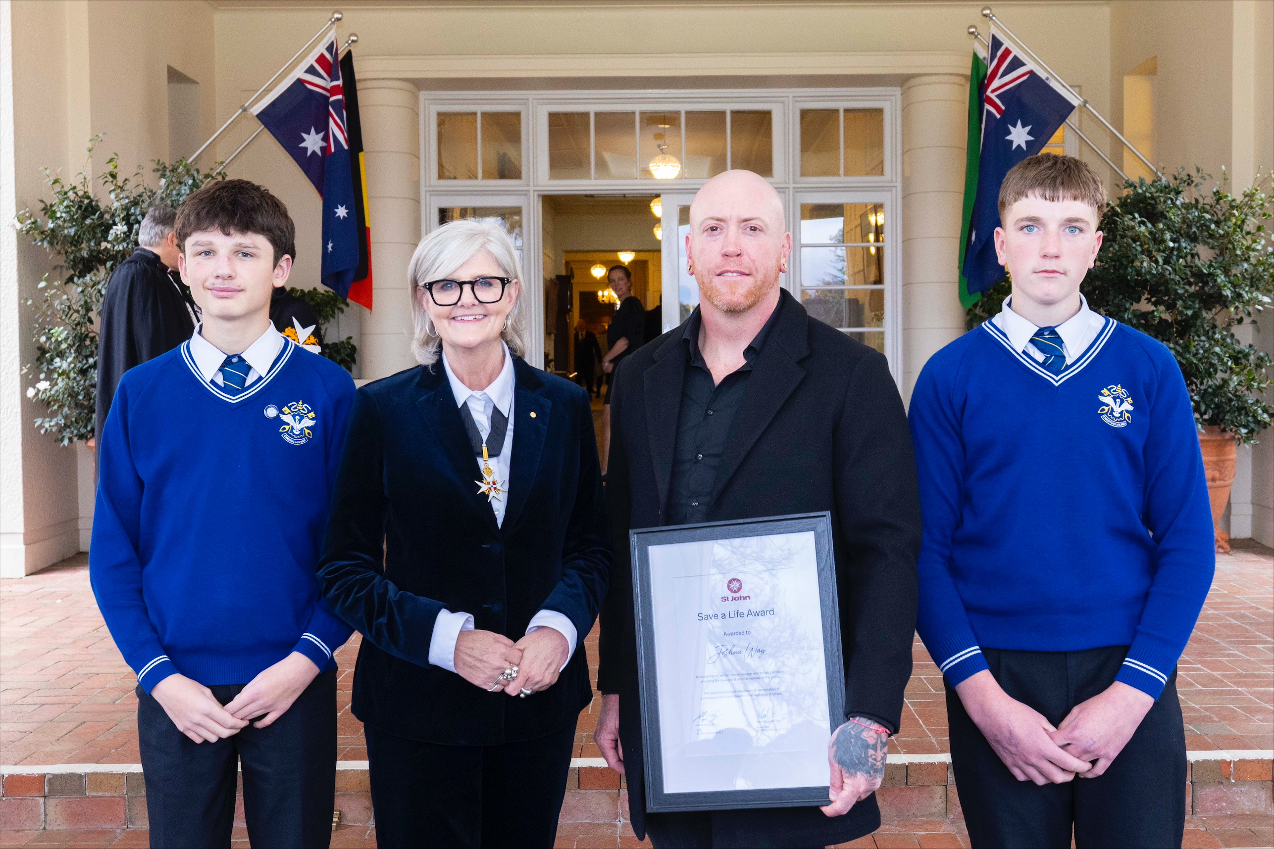 Governor-General stands with award recipient Josh Way