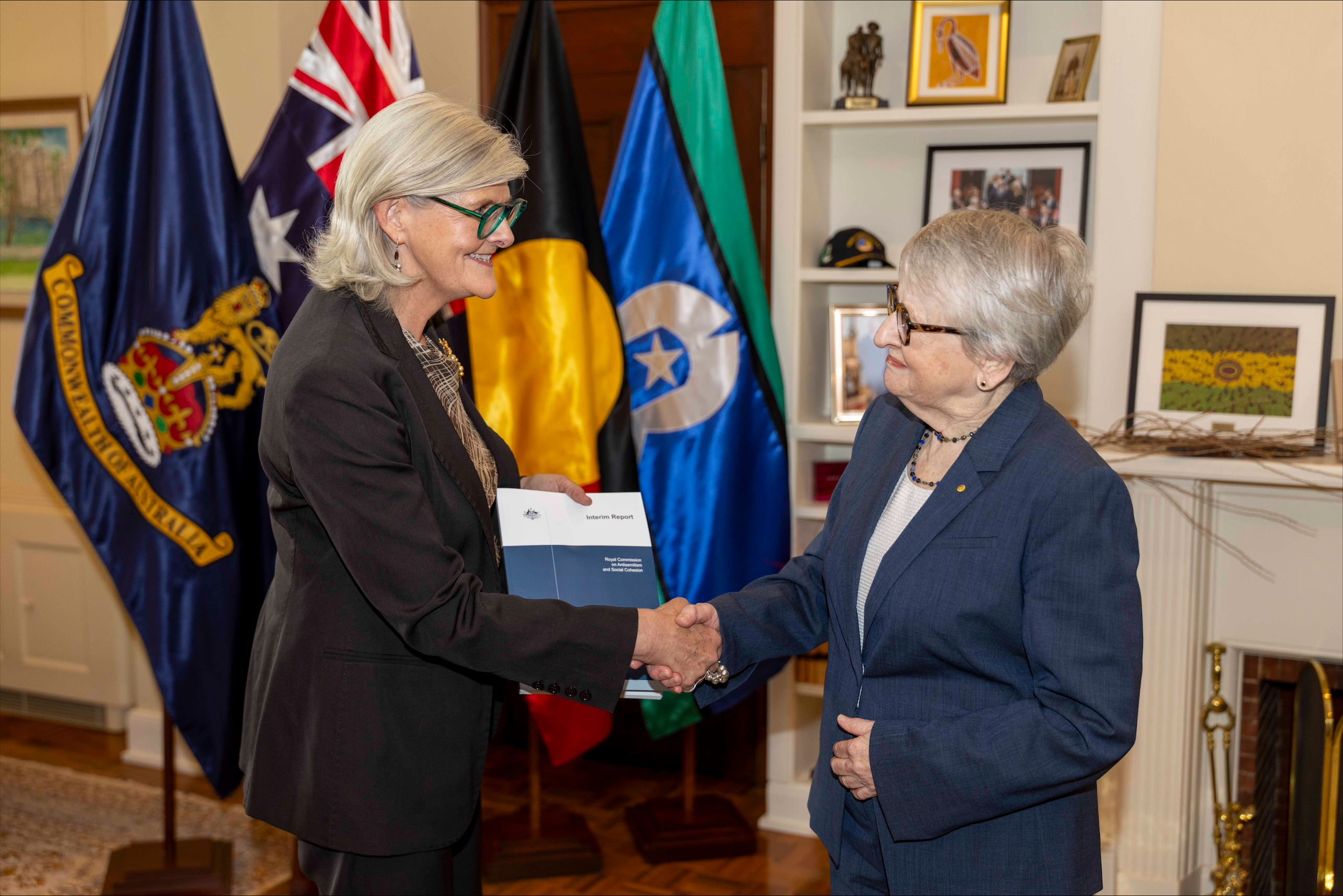 The Governor-General and the Commissioner shake hands