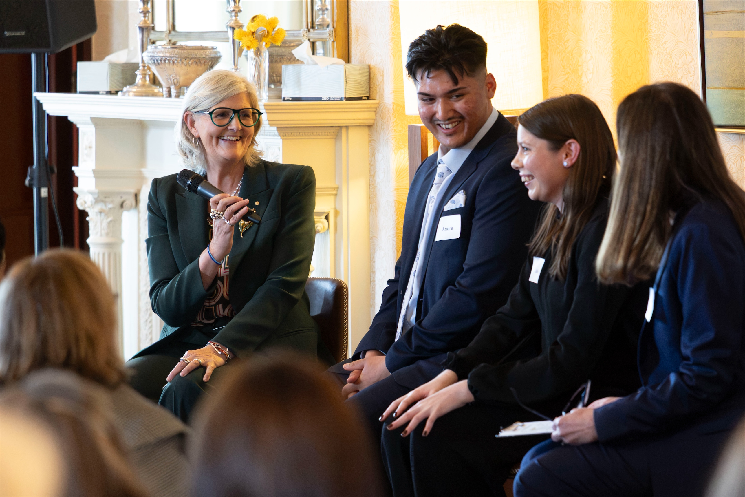 Governor-General speaking with panellists