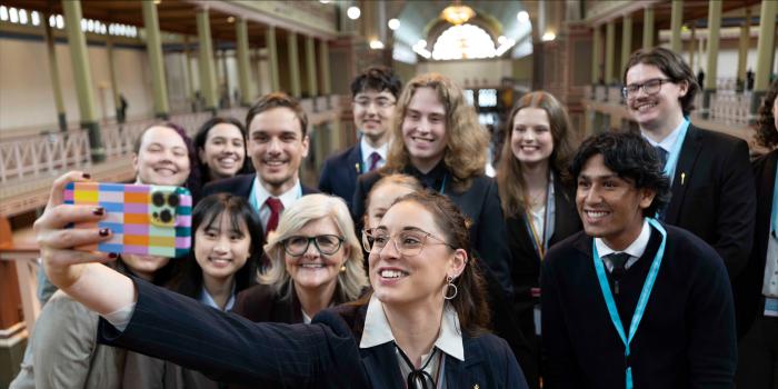Governor-General getting a selfie taken with students