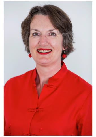 Headshot of Belinda Moss OAM, smiling