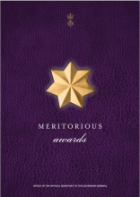 An image of a star against a purple background, text reads 'Meritorious Awards'